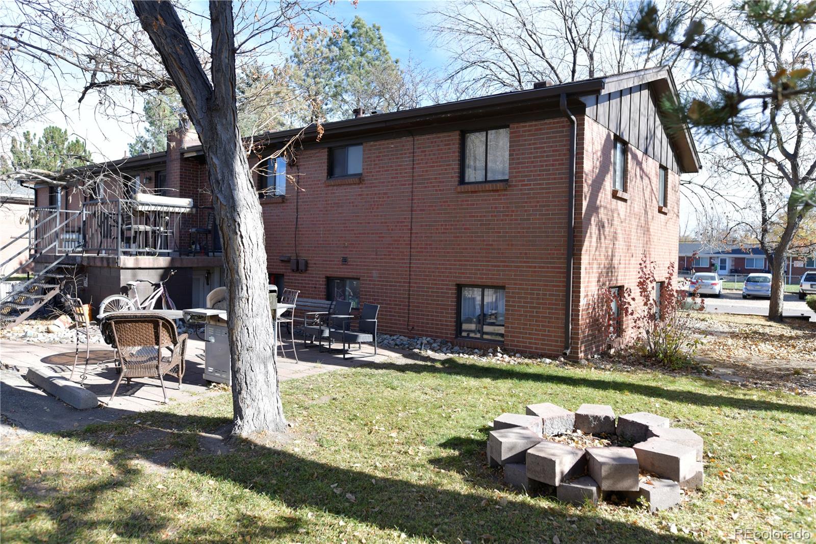 4563 Everett Street Wheat Ridge, CO 80033 - Photo 6 of 10 a front view of a house with garden