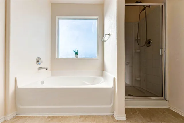 a view of a porch with hardwood