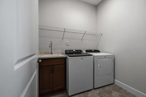 a building outdoor space with patio furniture and garden view