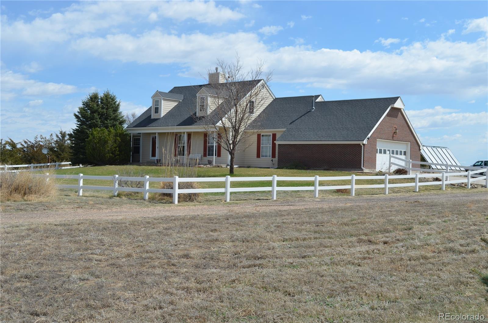 74500 East 136th Avenue Byers, CO 80103 - Photo 1 of 31 a view of a house with a yard
