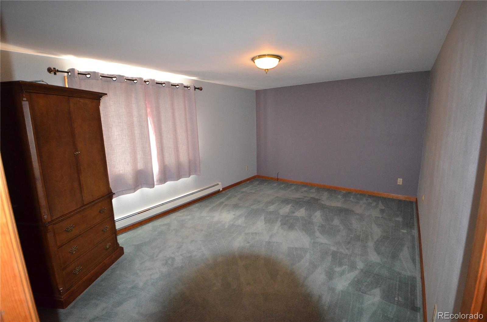 74500 East 136th Avenue Byers, CO 80103 - Photo 12 of 31 a view of an empty room with a window