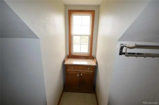 a bathroom with a sink and toilet