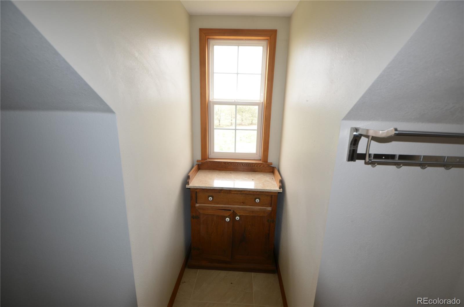 74500 East 136th Avenue Byers, CO 80103 - Photo 15 of 31 a bathroom with a sink and toilet