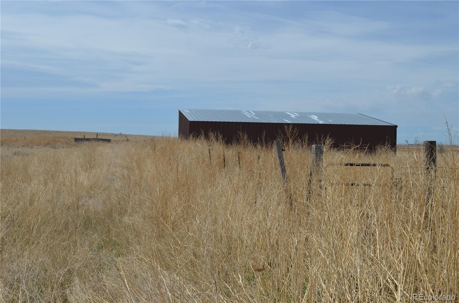 74500 East 136th Avenue Byers, CO 80103 - Photo 26 of 31 a view of wooden floor