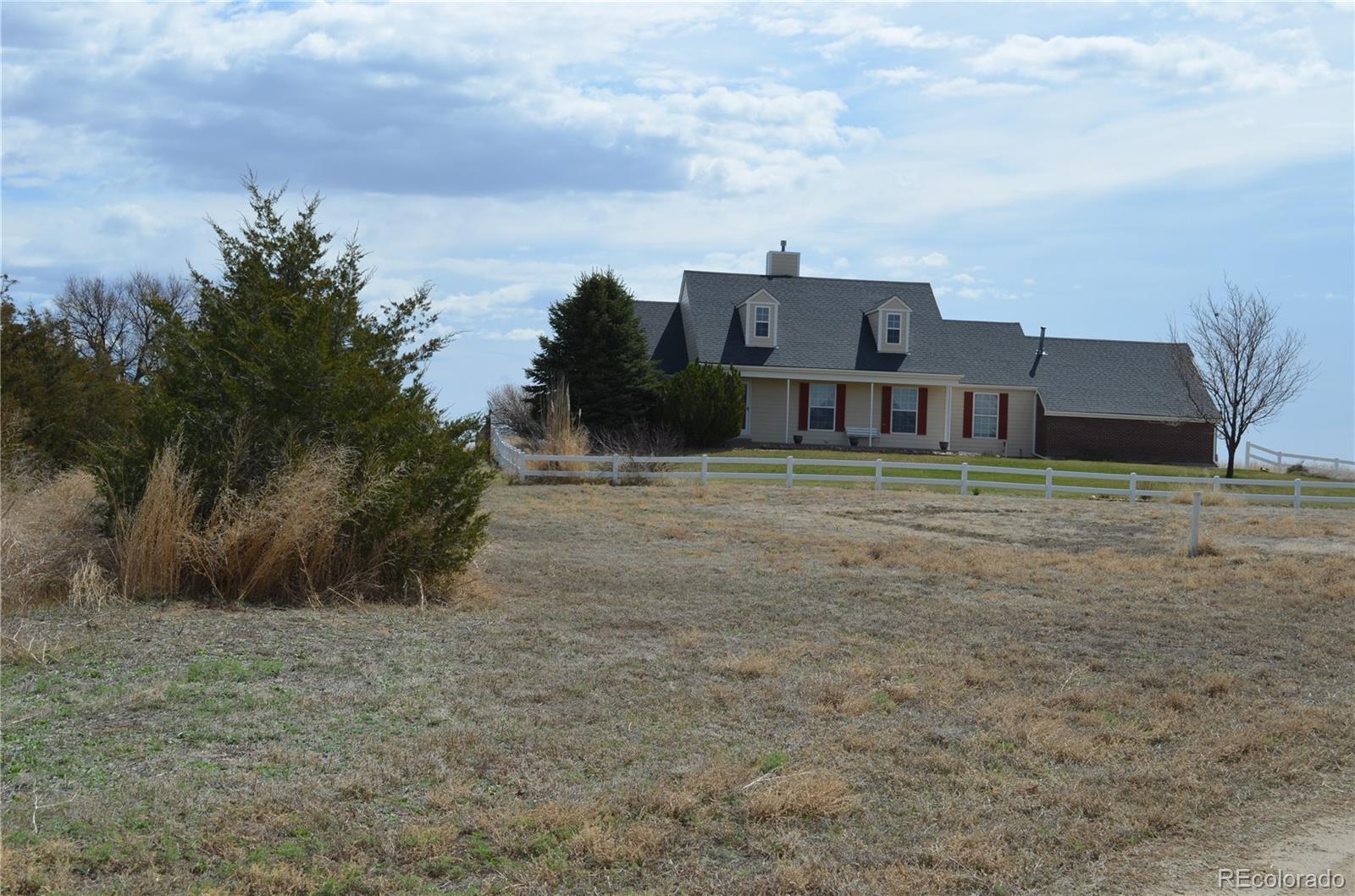 74500 East 136th Avenue Byers, CO 80103 - Photo 31 of 31 a view of a house with a yard