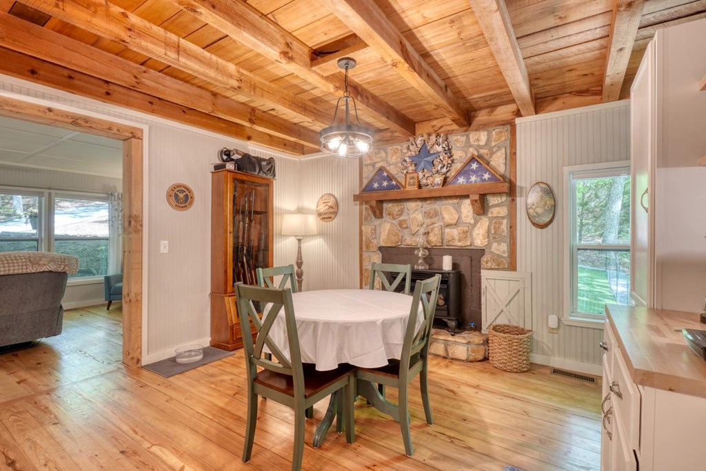 919 New Hope Road Morganton, GA 30560 - Photo 25 of 52 a view of a dining room with furniture and wooden floor