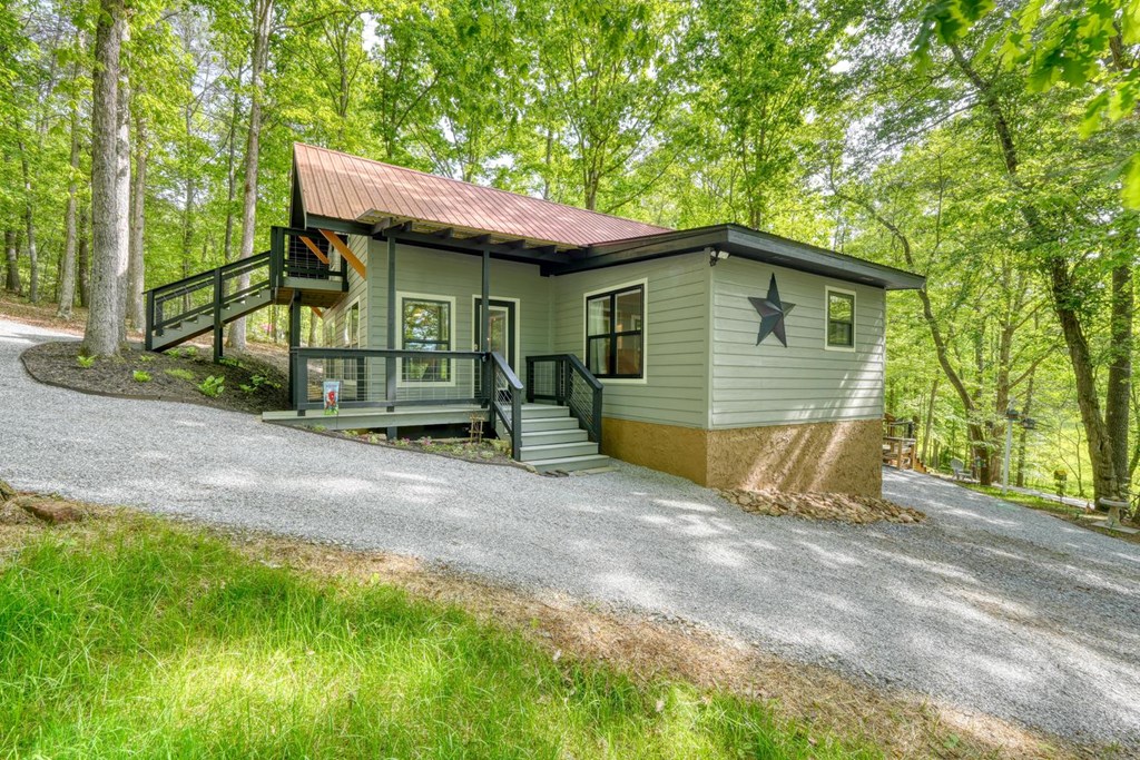 919 New Hope Road Morganton, GA 30560 - Photo 3 of 52 a view of a house with a yard