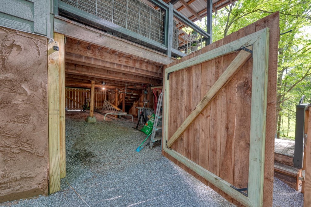 919 New Hope Road Morganton, GA 30560 - Photo 48 of 52 a view of a porch with wooden floor and stairs