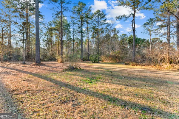 a view of a building with a street