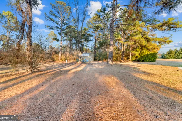 a view of a entrance gate of a house