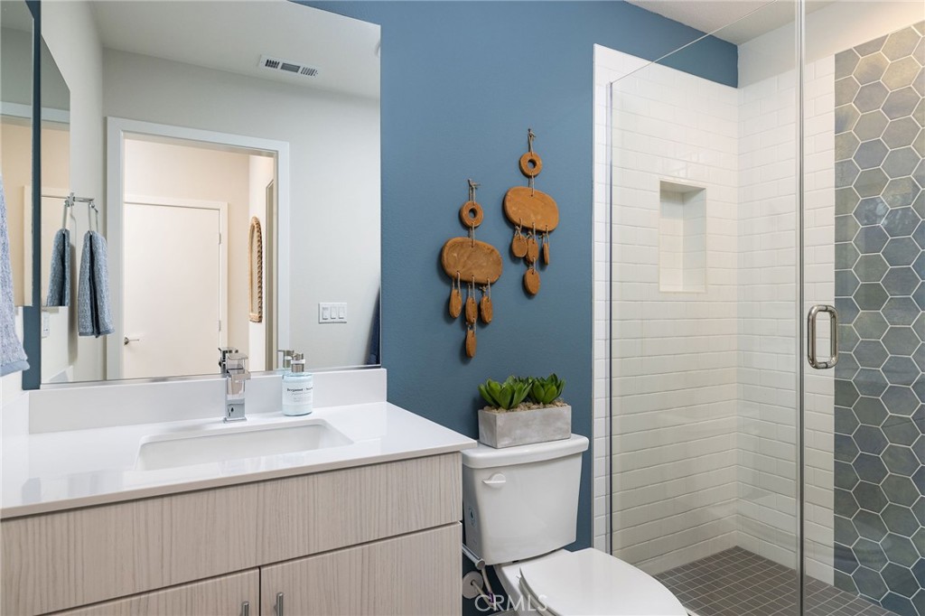 121 Towns Avenue Upland, CA 91786 - Photo 4 of 5 a bathroom with a sink toilet and shower