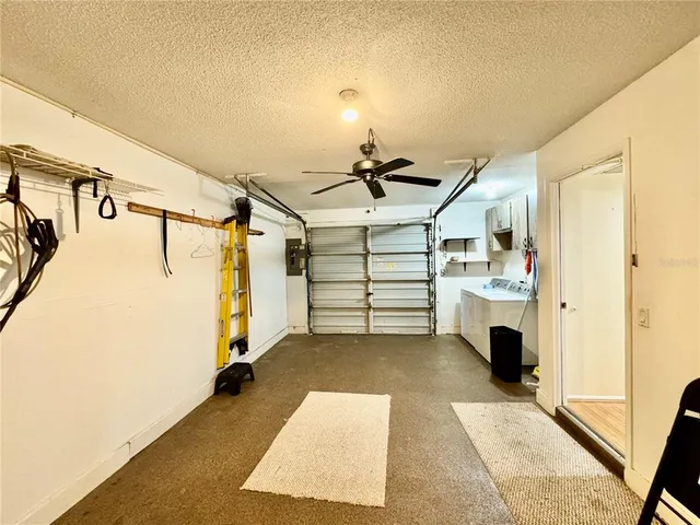 a view of a room with stairs and a couch