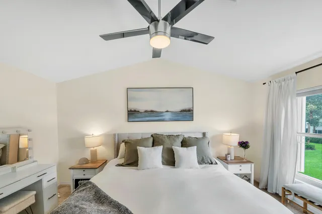 a bathroom with a shower and toilet