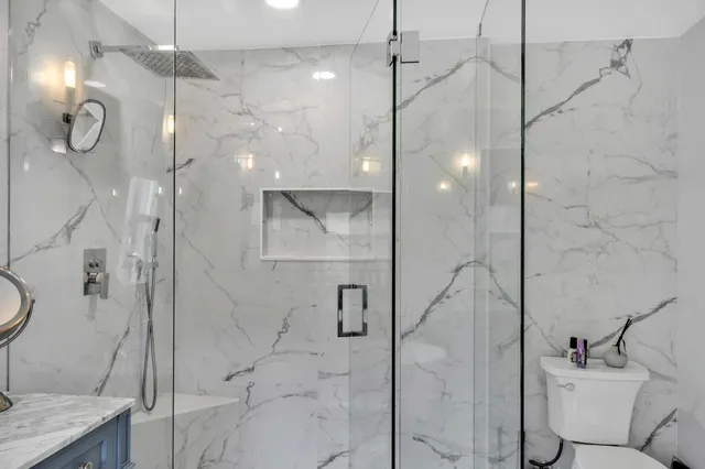 a path view of a backyard of the house