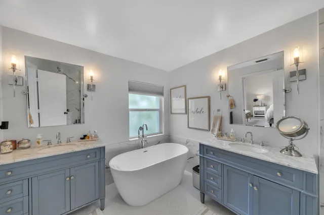 front view of a house with a large window