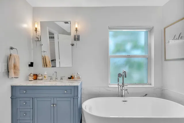 a view of a house with a potted plant