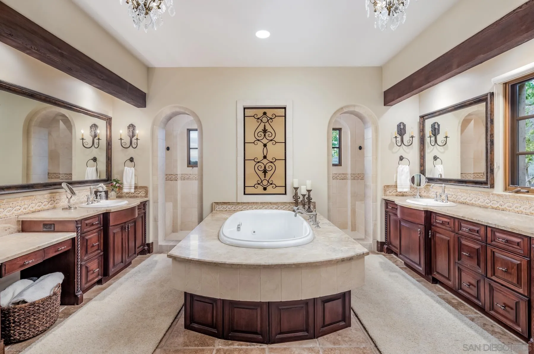 18669 Via Catania Rancho Santa Fe, CA 92091 - Photo 18 of 39 a bathroom with a granite countertop double vanity sink and a mirror