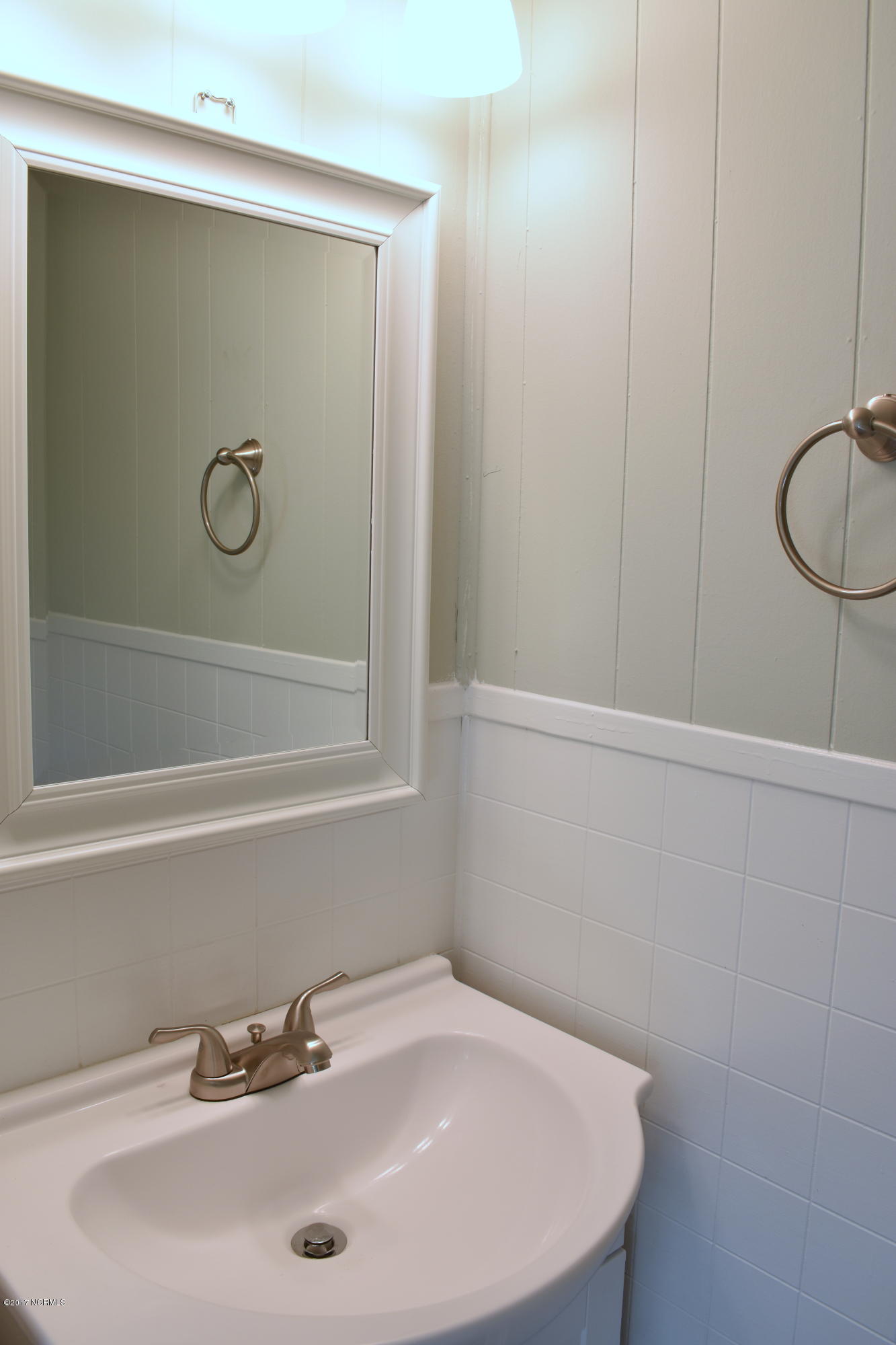 1010 Thompson Chapel Road Wilson, NC 27896 - Photo 13 of 22 Beautiful New Sink, with Overhanging Framed Mirror