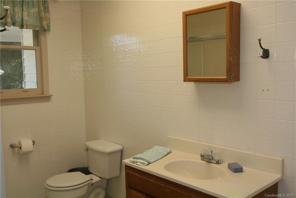 7540 Jones Road Salisbury, NC 28147 - Photo 16 of 24 a bathroom with a sink toilet and mirror