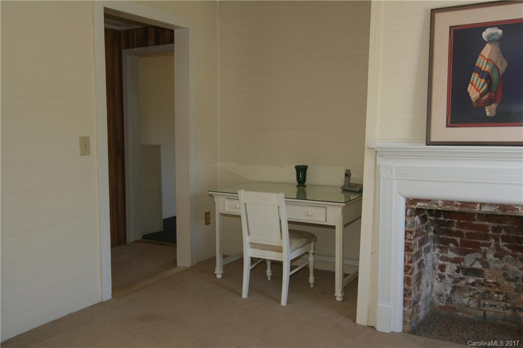 7540 Jones Road Salisbury, NC 28147 - Photo 5 of 24 a dining room with furniture and a fireplace