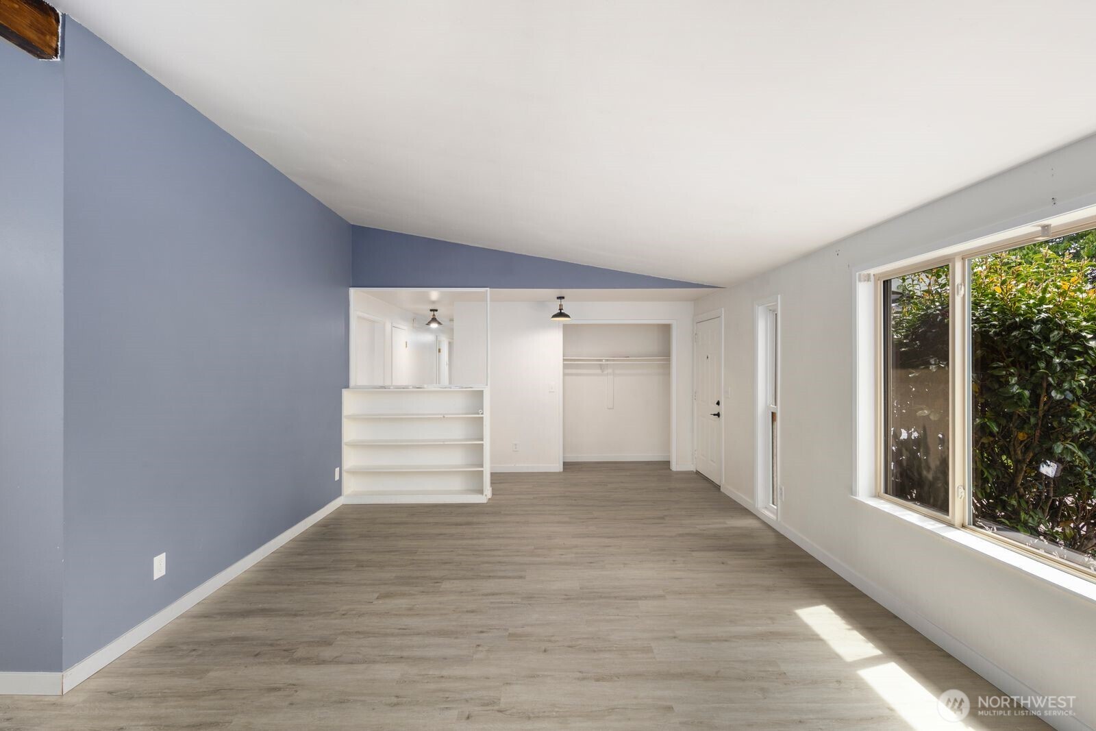 101 161st Street Southeast Bothell, WA 98012 - Photo 10 of 34 a view of empty room with wooden floor and fan