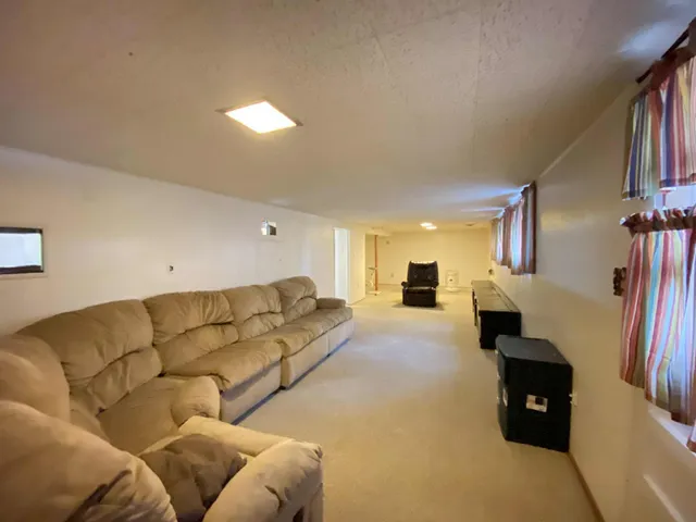 a living room with furniture and a couch
