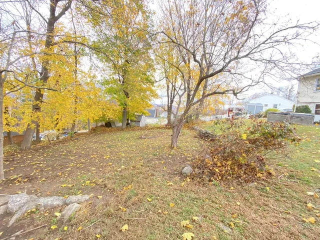 a view of yard covered with snow