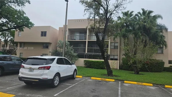 a house view with a garden space