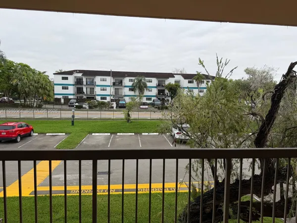 a view of building with yard