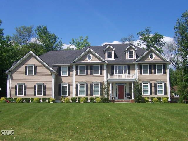 10 Belden Hill Road Brookfield, CT 06804 - Photo 1 of 1 a front view of a house with a garden