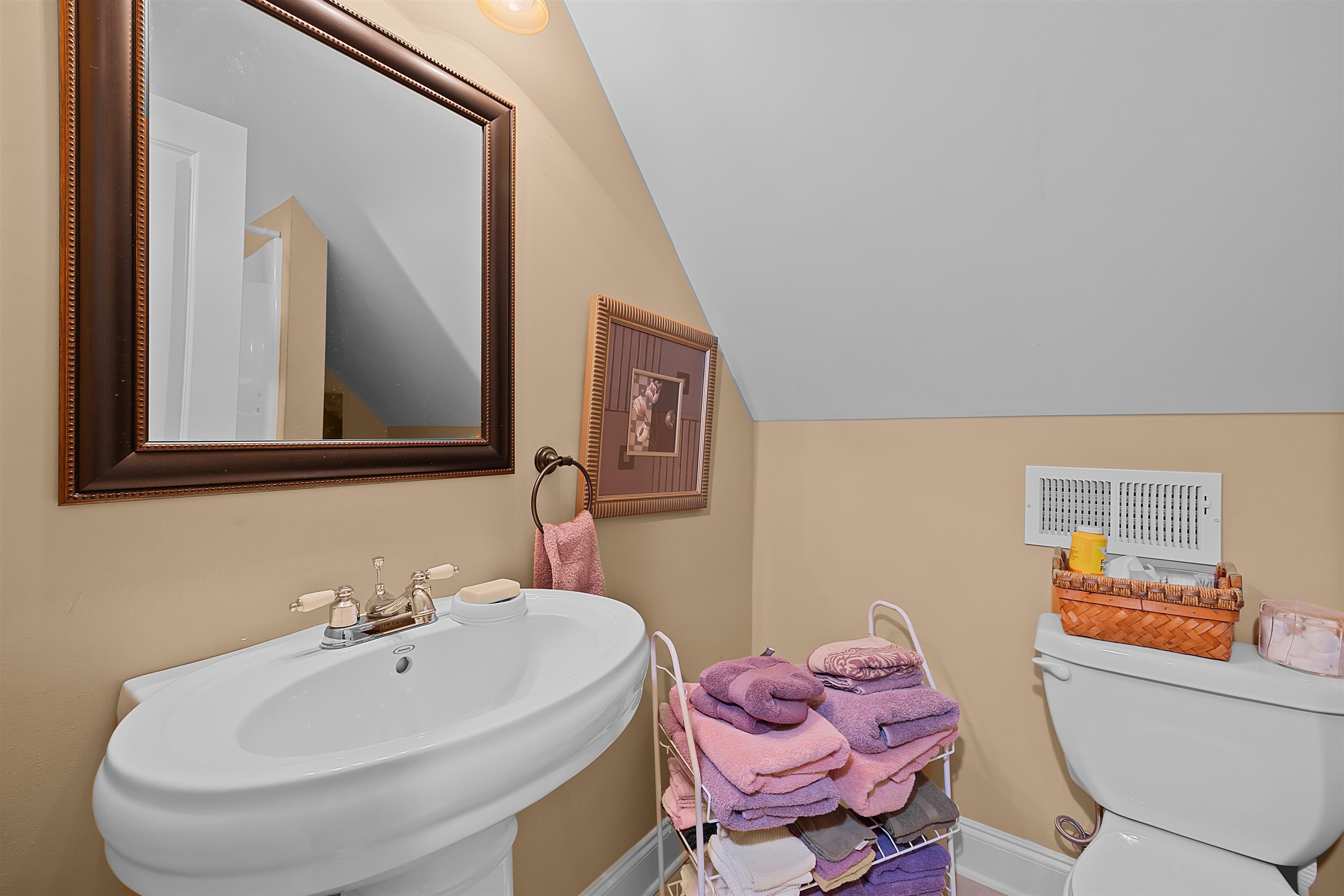 180 Strobbe Lane Counce, TN 38326 - Photo 17 of 25 a bathroom with a sink mirror and toilet
