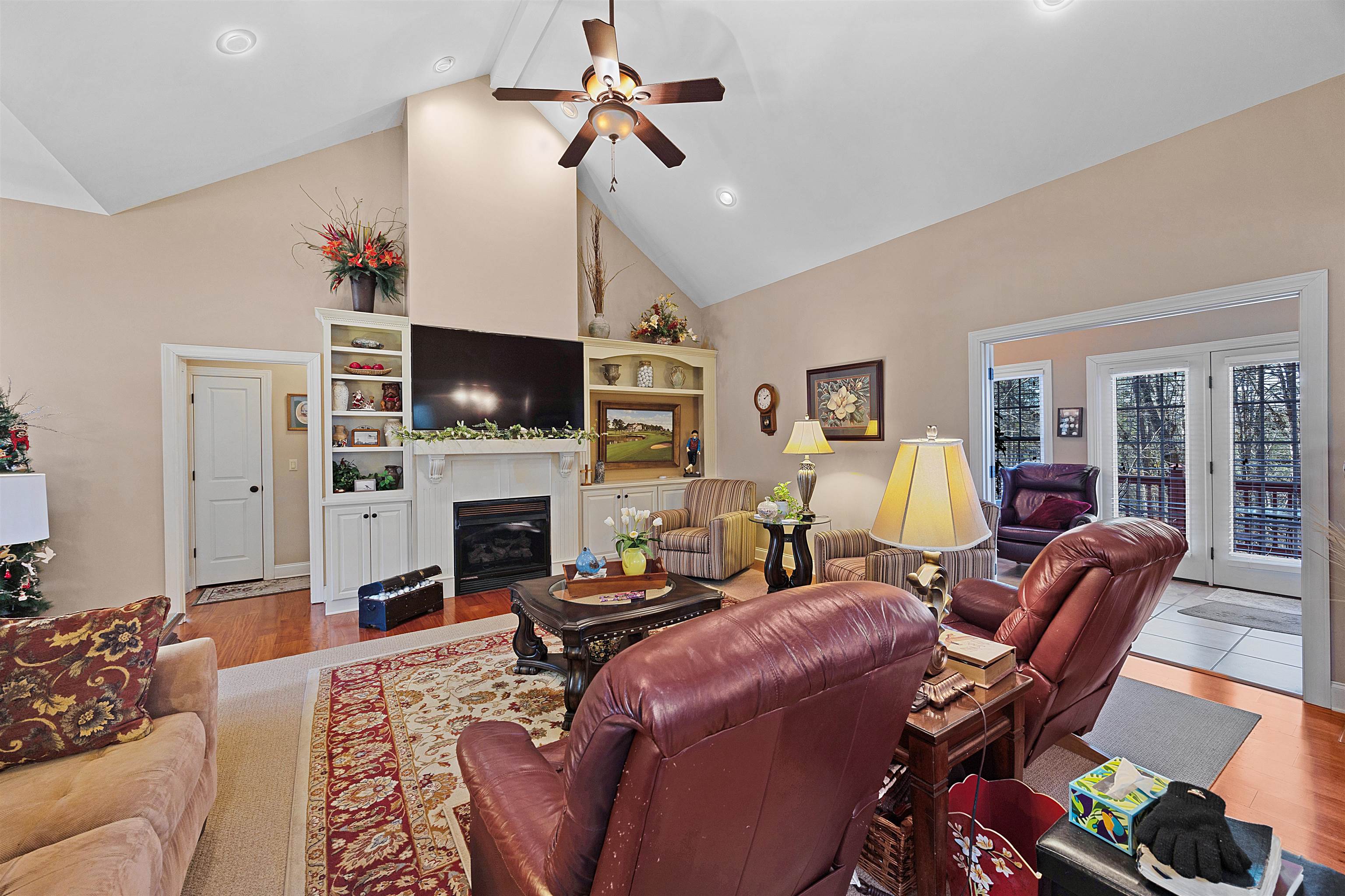 180 Strobbe Lane Counce, TN 38326 - Photo 3 of 25 a living room with furniture a fireplace and a flat screen tv