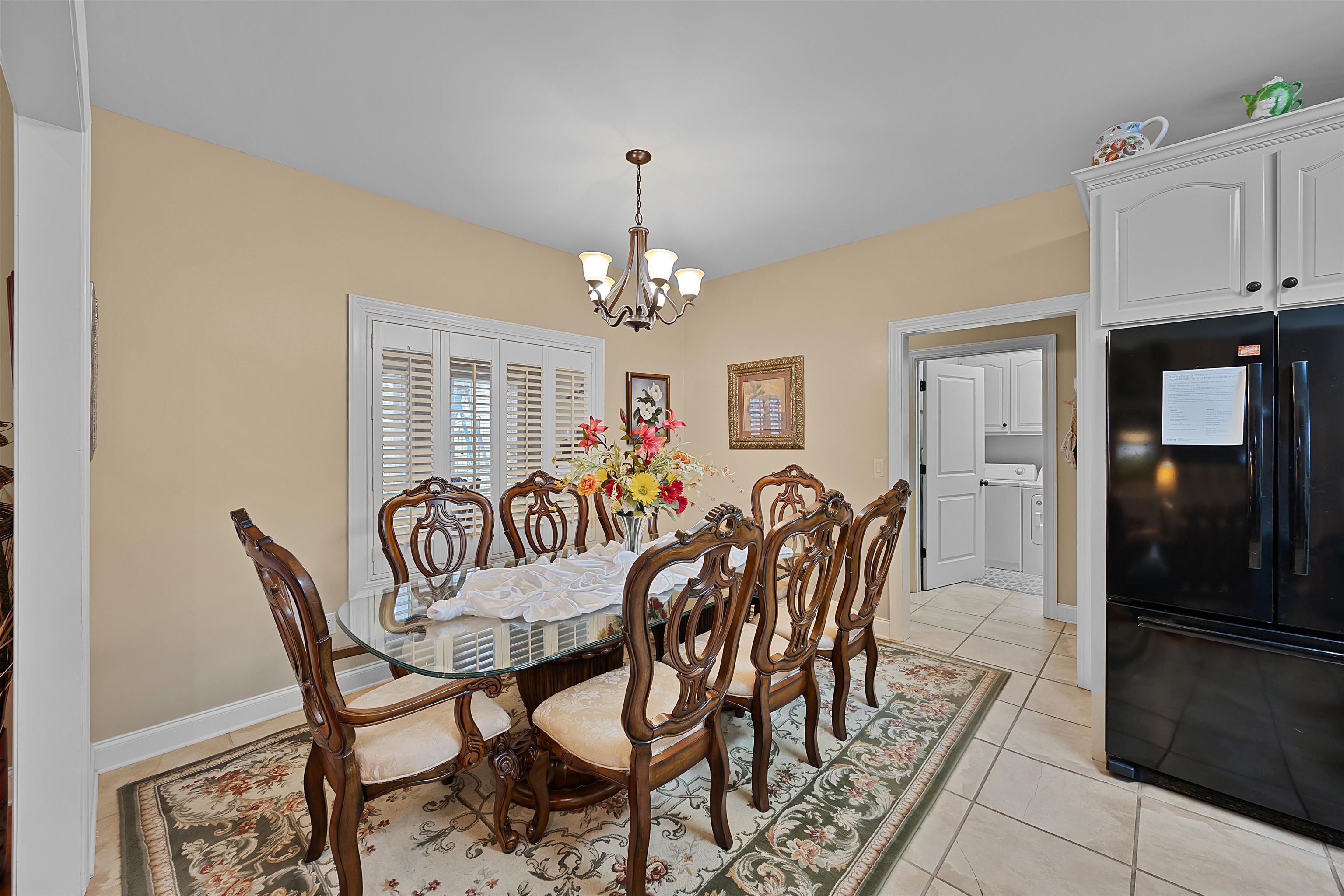 180 Strobbe Lane Counce, TN 38326 - Photo 8 of 25 a view of a dining room with furniture and chandelier