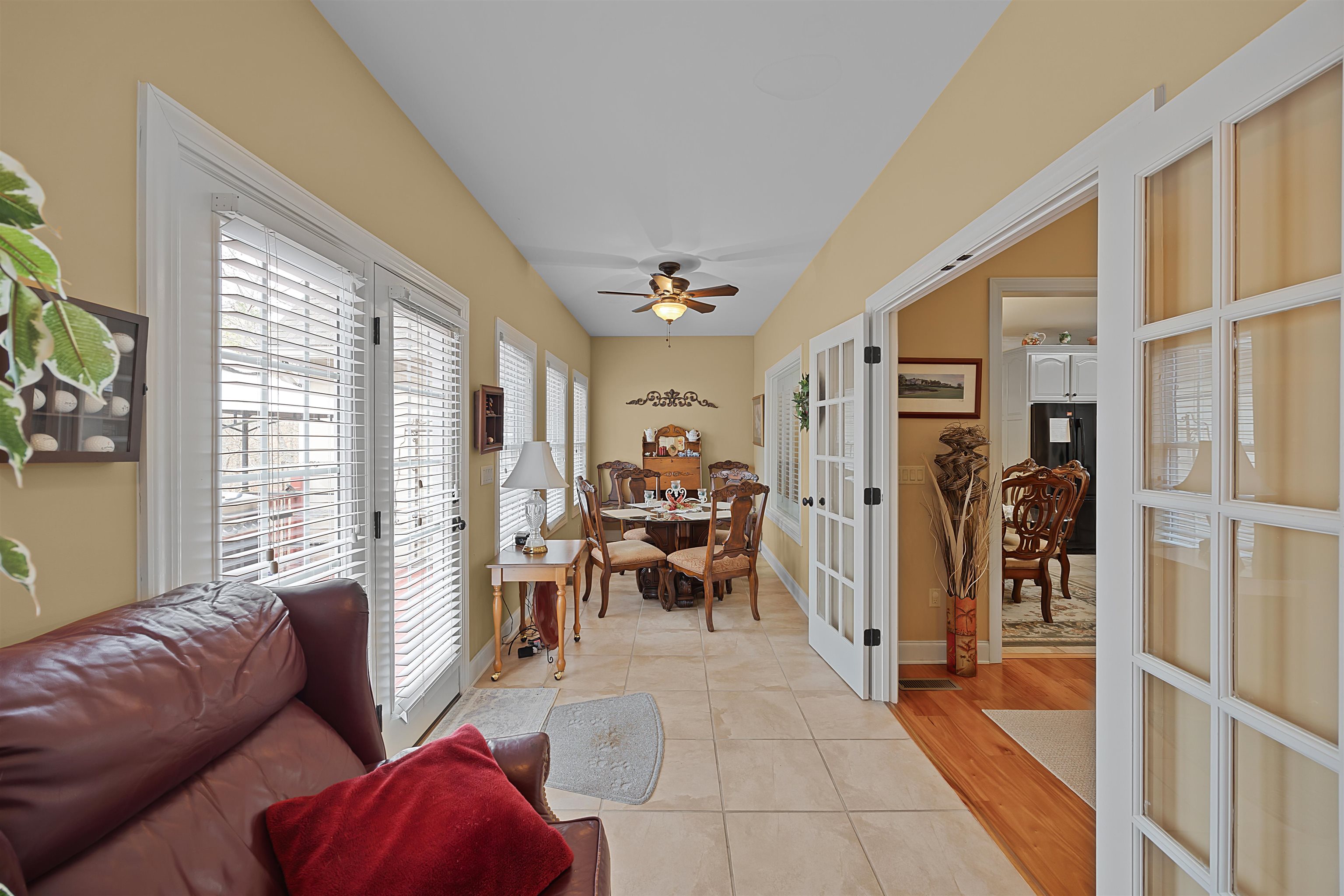 180 Strobbe Lane Counce, TN 38326 - Photo 9 of 25 a living room with furniture a large window and a chandelier
