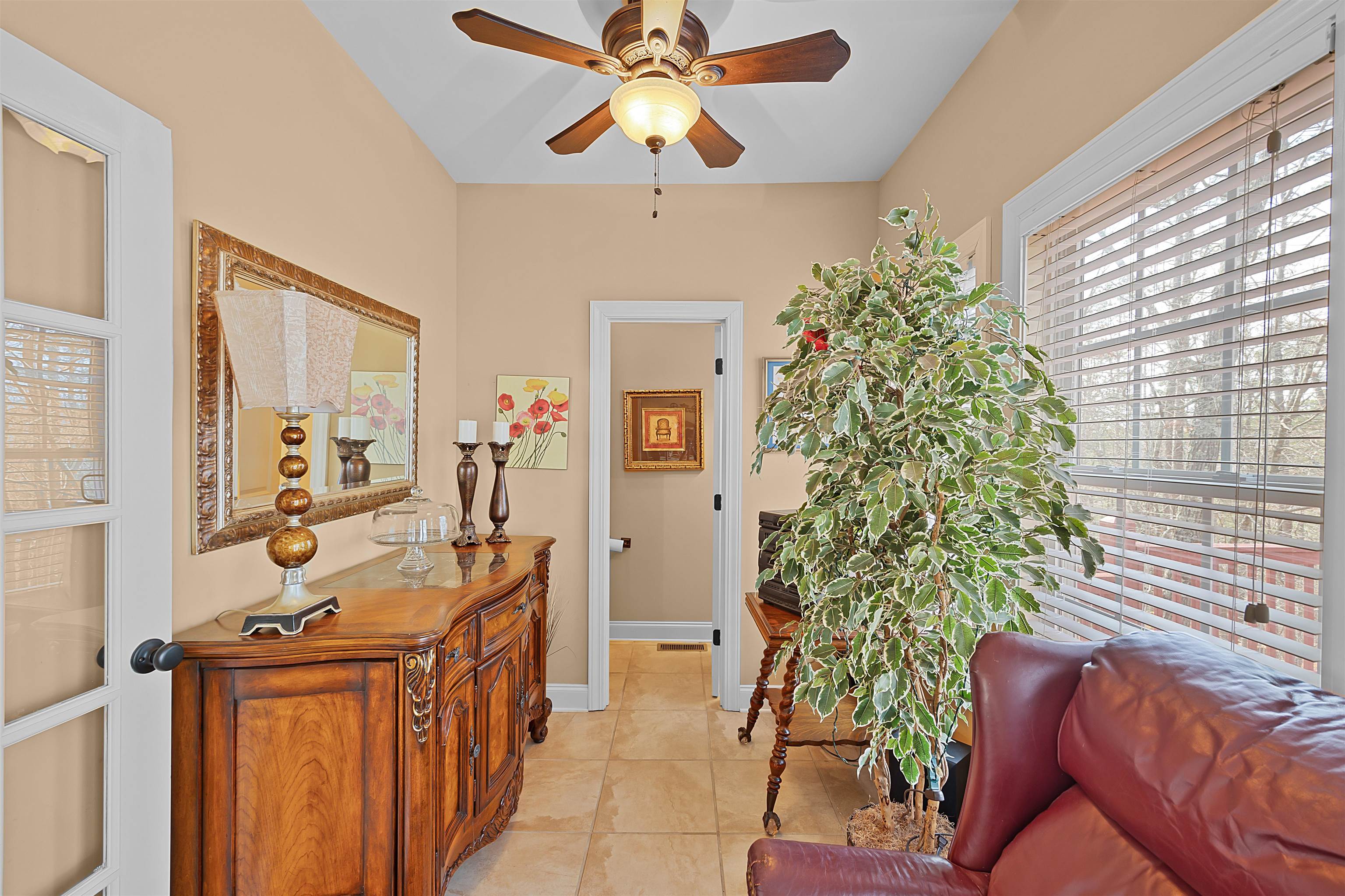 180 Strobbe Lane Counce, TN 38326 - Photo 10 of 25 a view of a livingroom with furniture window and hardwood floor