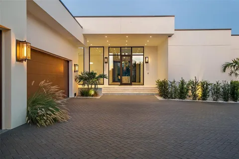 a view of a building with potted plants