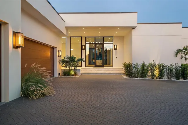 a view of a building with potted plants