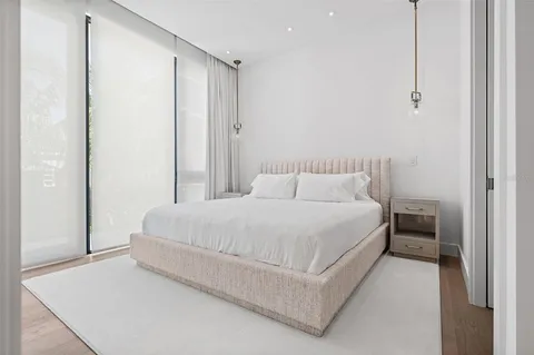 a bathroom with a shower toilet and sink