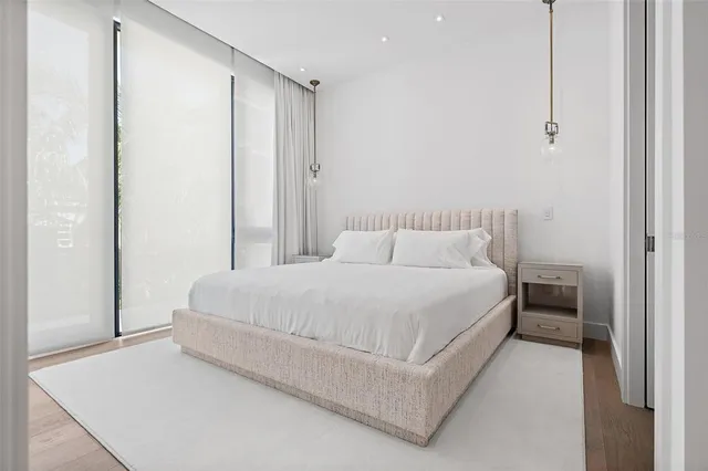 a bathroom with a shower toilet and sink