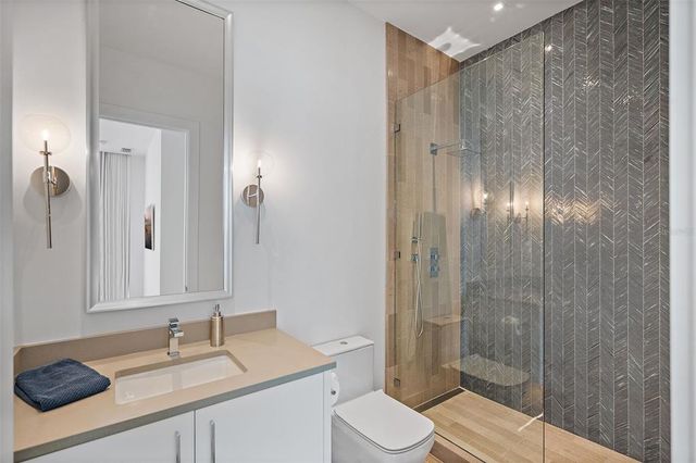 a kitchen with a stove and cabinets
