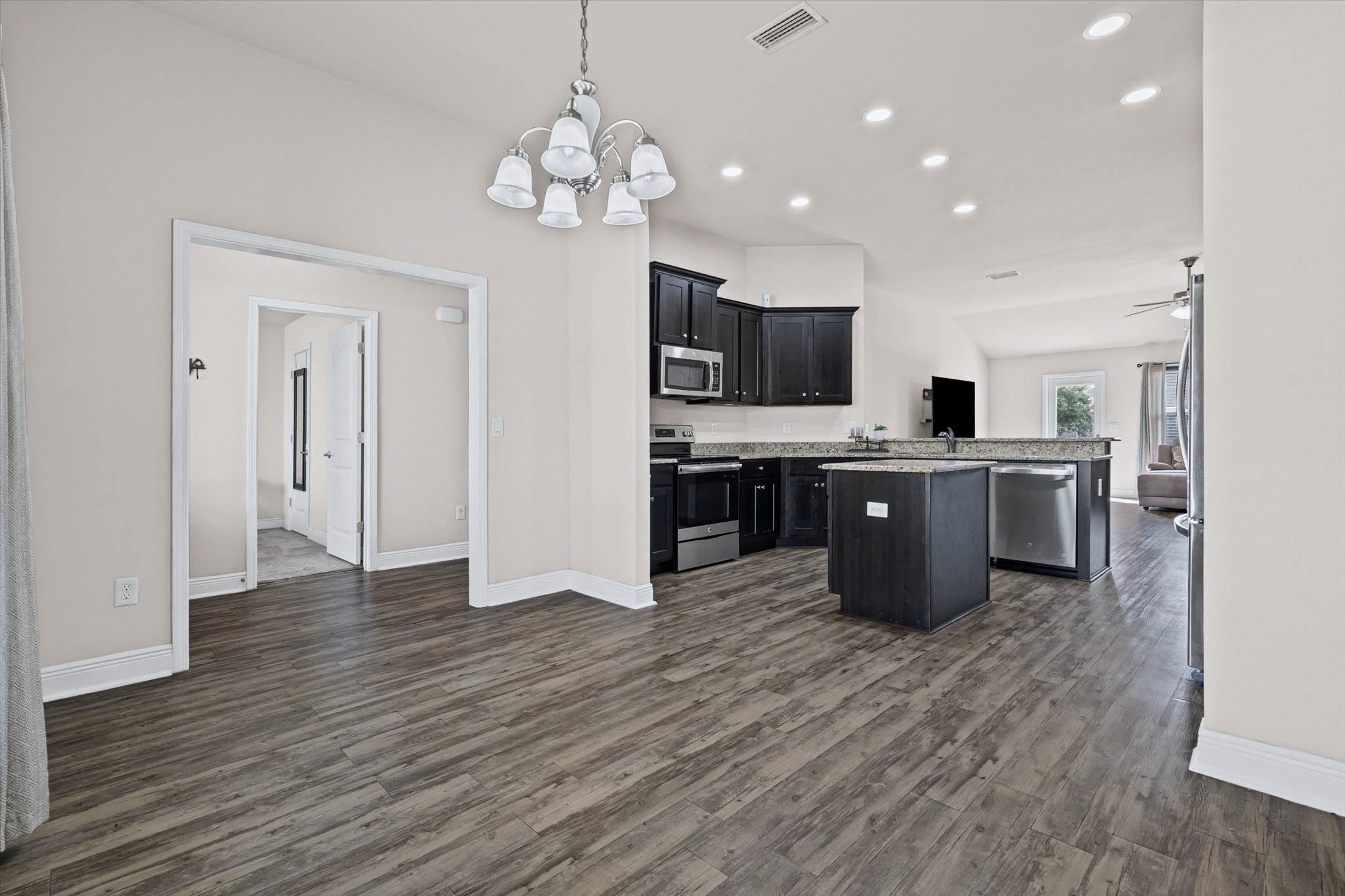 14607 Silvermere Drive Foley, AL 36535 - Photo 5 of 31 Dining Room looking into the Kitchen