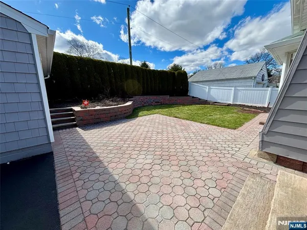 a view of a backyard with a garden