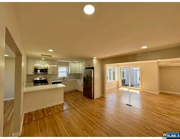 a view of a kitchen from a living room