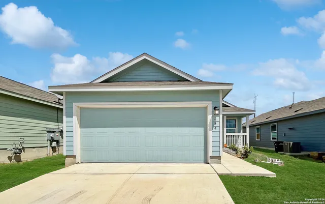 a front view of house with yard