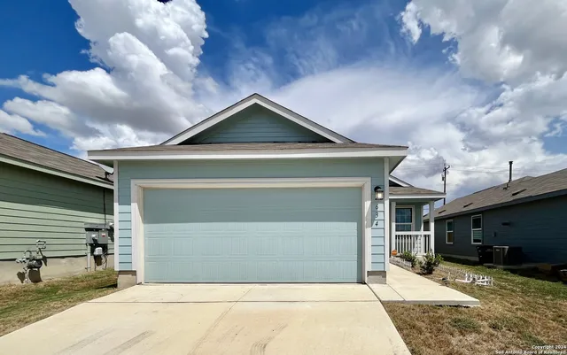 a picture of a room with a bench and a wooden floor