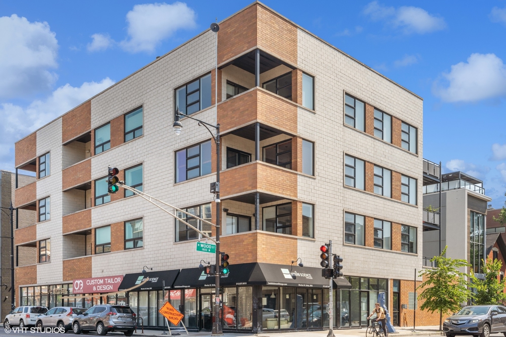 1555 North Wood Street, Unit 302 Chicago, IL 60622 - Photo 1 of 14 a front view of a building