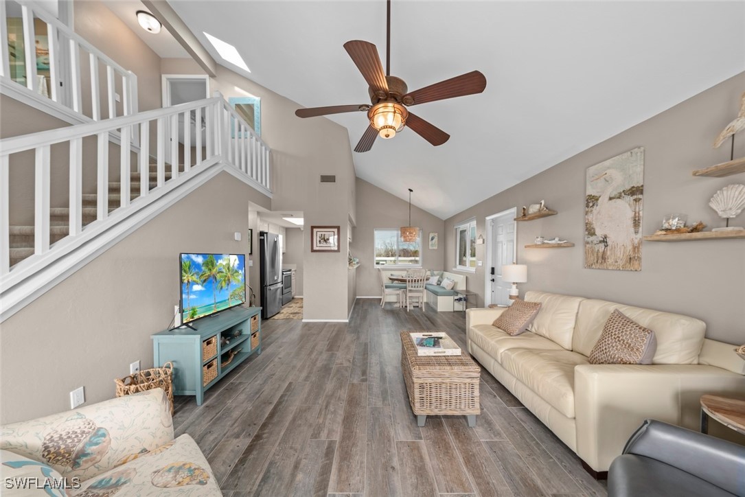 1651 Sand Castle Road Sanibel, FL 33957 - Photo 12 of 50 a living room with furniture and a flat screen tv