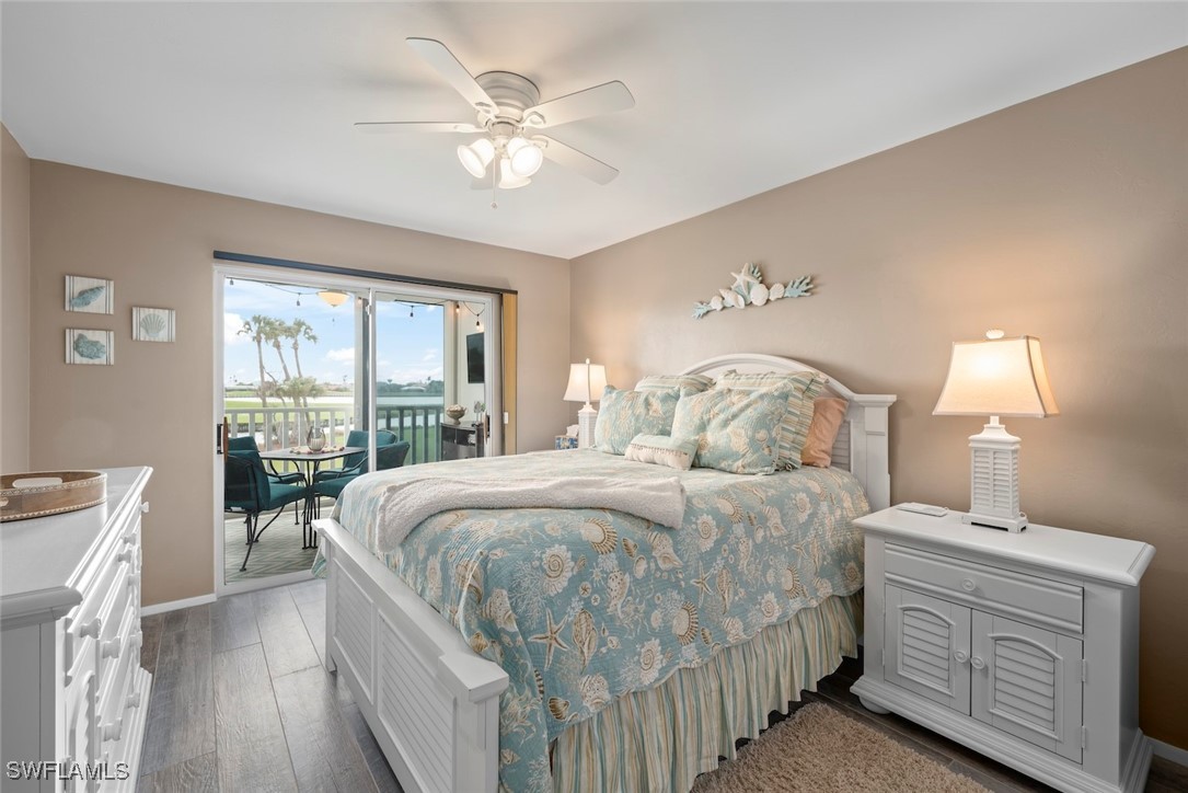 1651 Sand Castle Road Sanibel, FL 33957 - Photo 25 of 50 a bed room with a bed and a chandelier