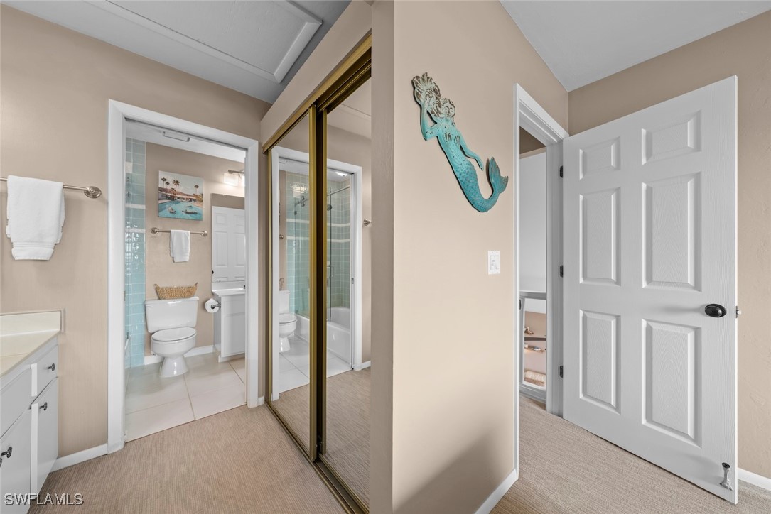 1651 Sand Castle Road Sanibel, FL 33957 - Photo 36 of 50 a bathroom with a shower and a toilet