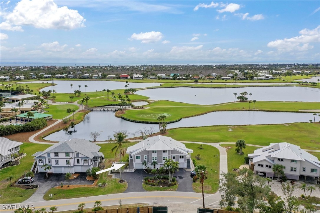 1651 Sand Castle Road Sanibel, FL 33957 - Photo 4 of 50 a view of a city with lawn chairs